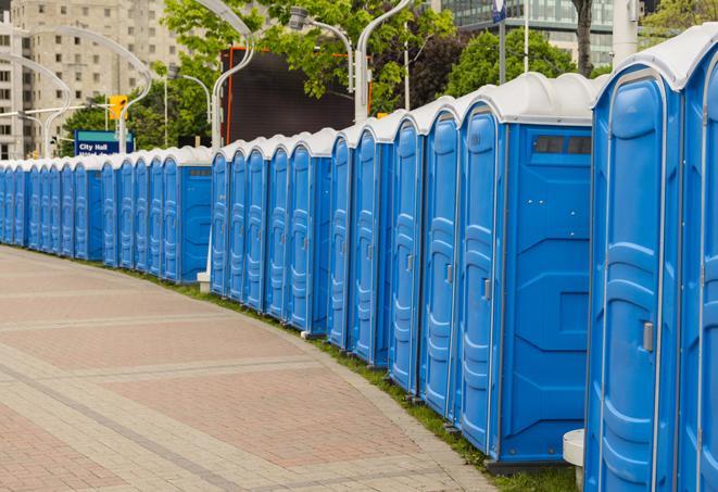 a row of portable restrooms for a special event, ensuring guests have access to clean facilities in Alafaya